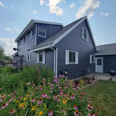 Light Gray to Dark Blue Steel Sided House 2022